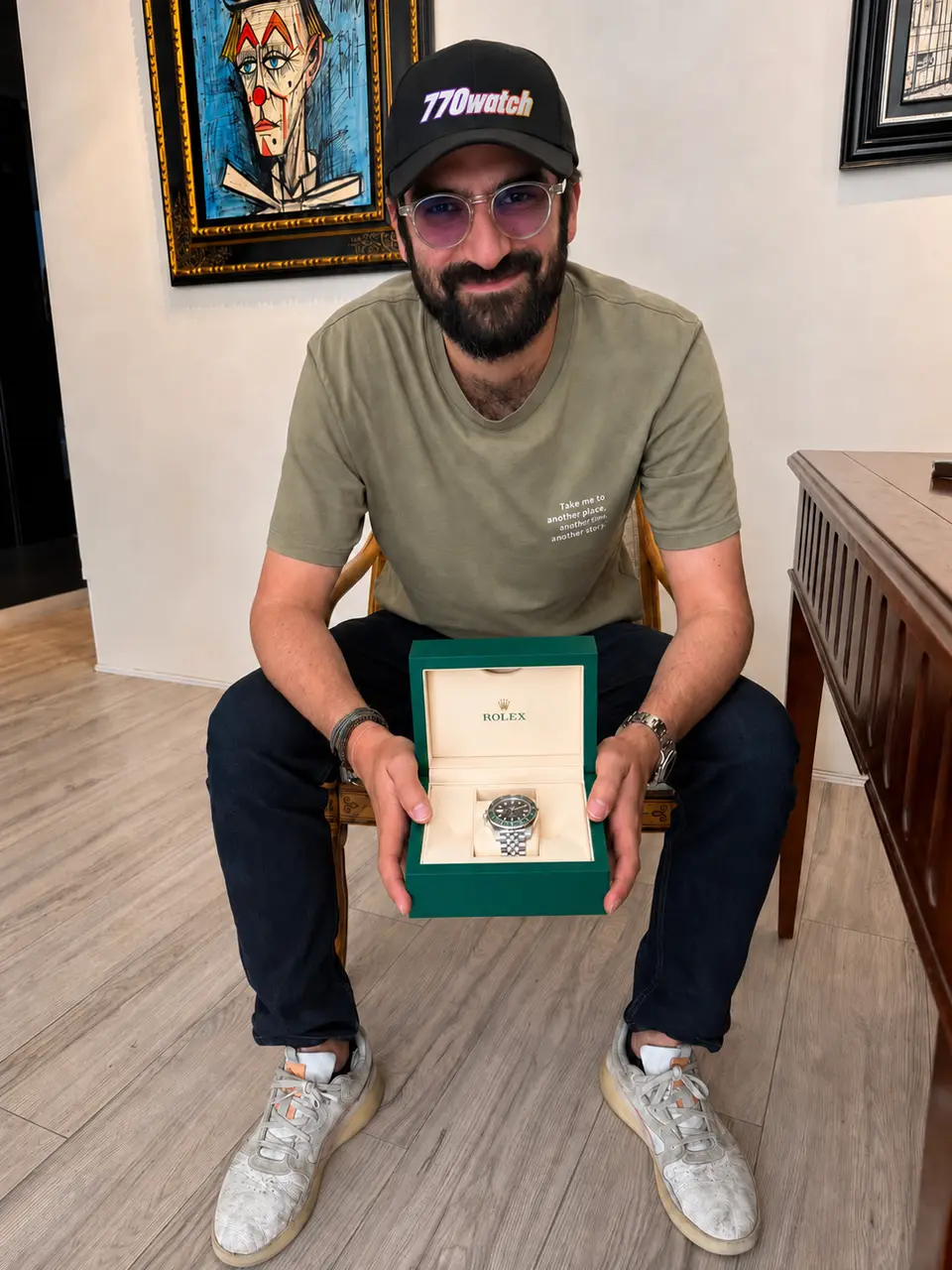 Cedric M. holding his Rolex GMT-Master II the day he received it